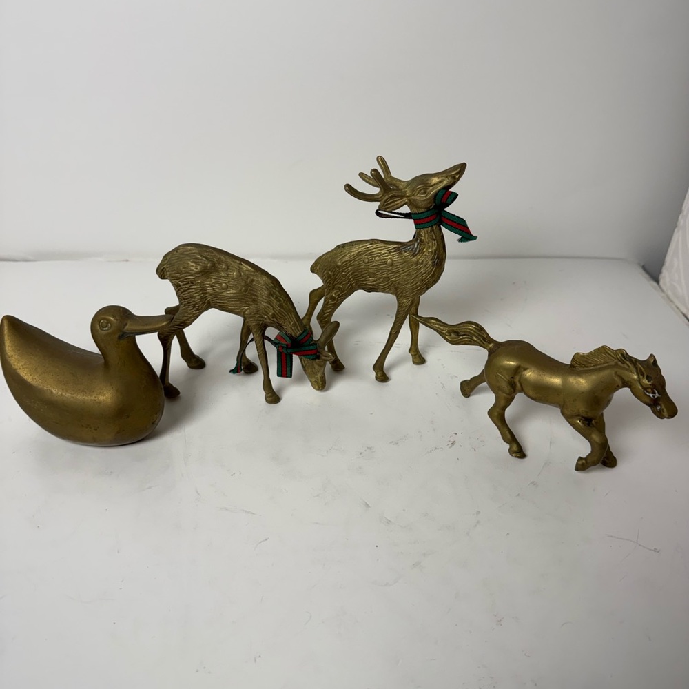 Collection of 4 vintage brass animal figurines.